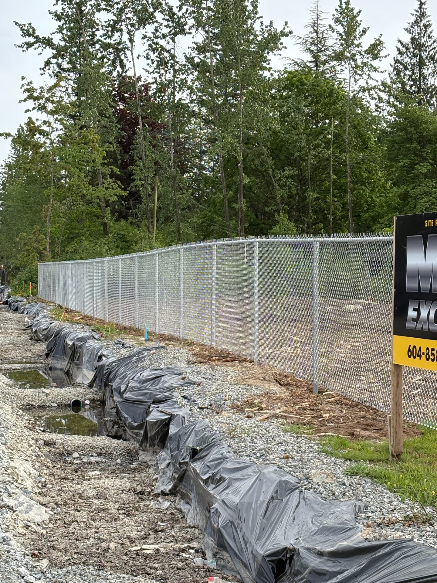 Galvanized chain link construction site security fence