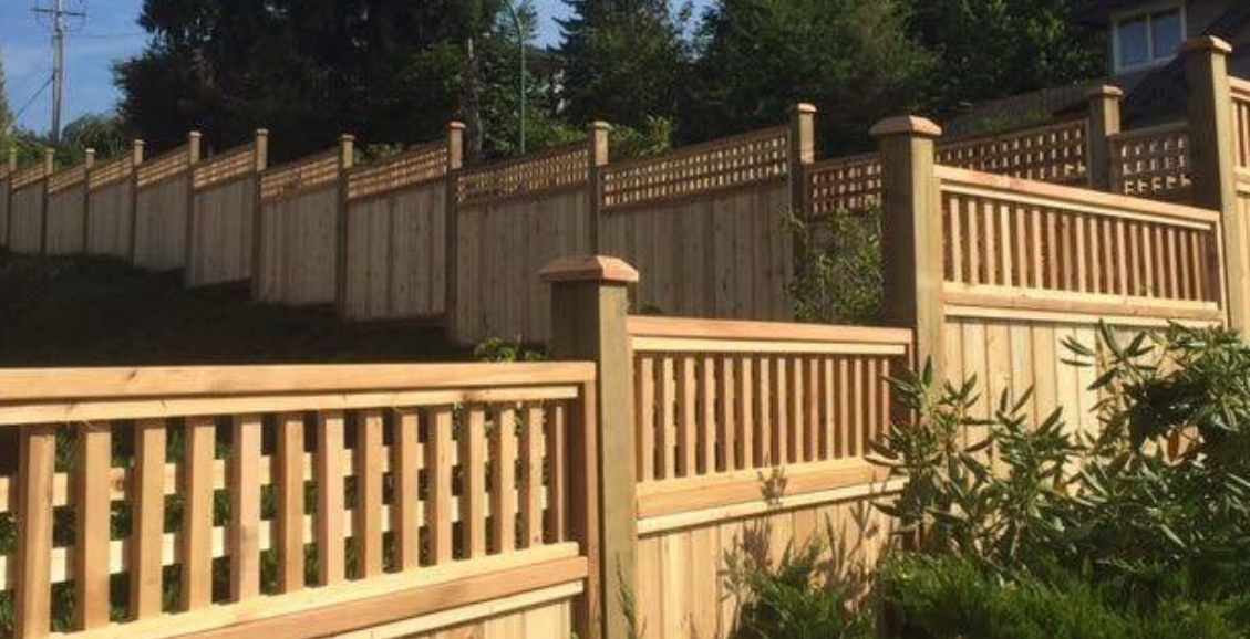Cedar fence with decorative lattice and spindle top detailing
